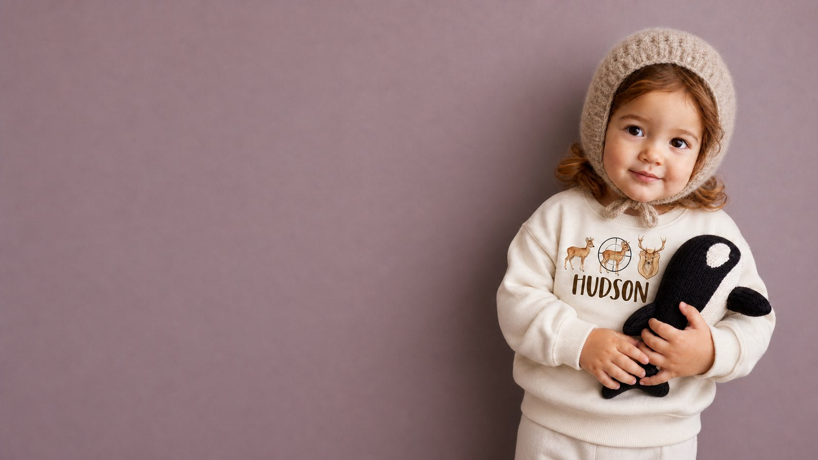 Toddler wearing a personalized Cozyorca Hudson woodland birthday outfit